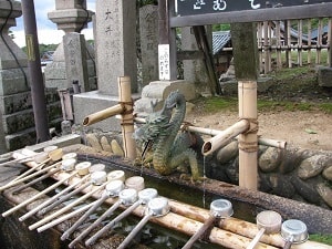 Cleansing cups at Buddist temple