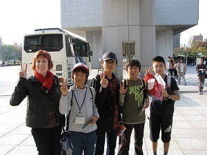 Wendy and school children at Hiroshima peace museum